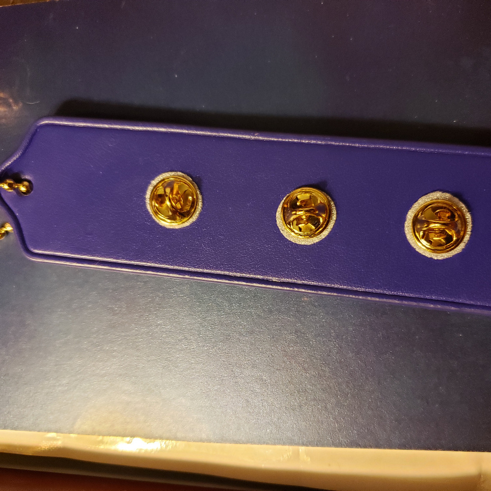 Coach Leather varsity pen bookmark